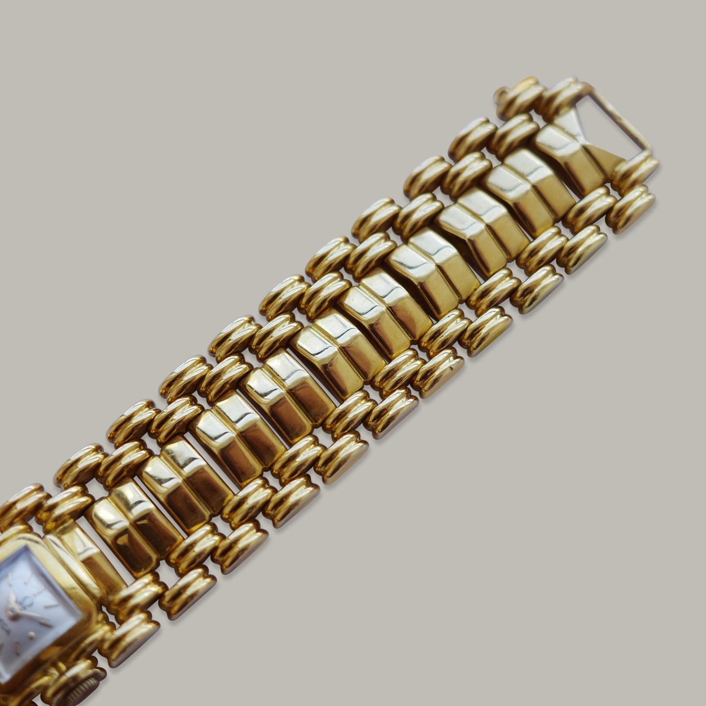 18K Omega Ladies Integrated Bracelet Watch