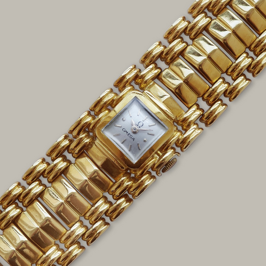 18K Omega Ladies Integrated Bracelet Watch