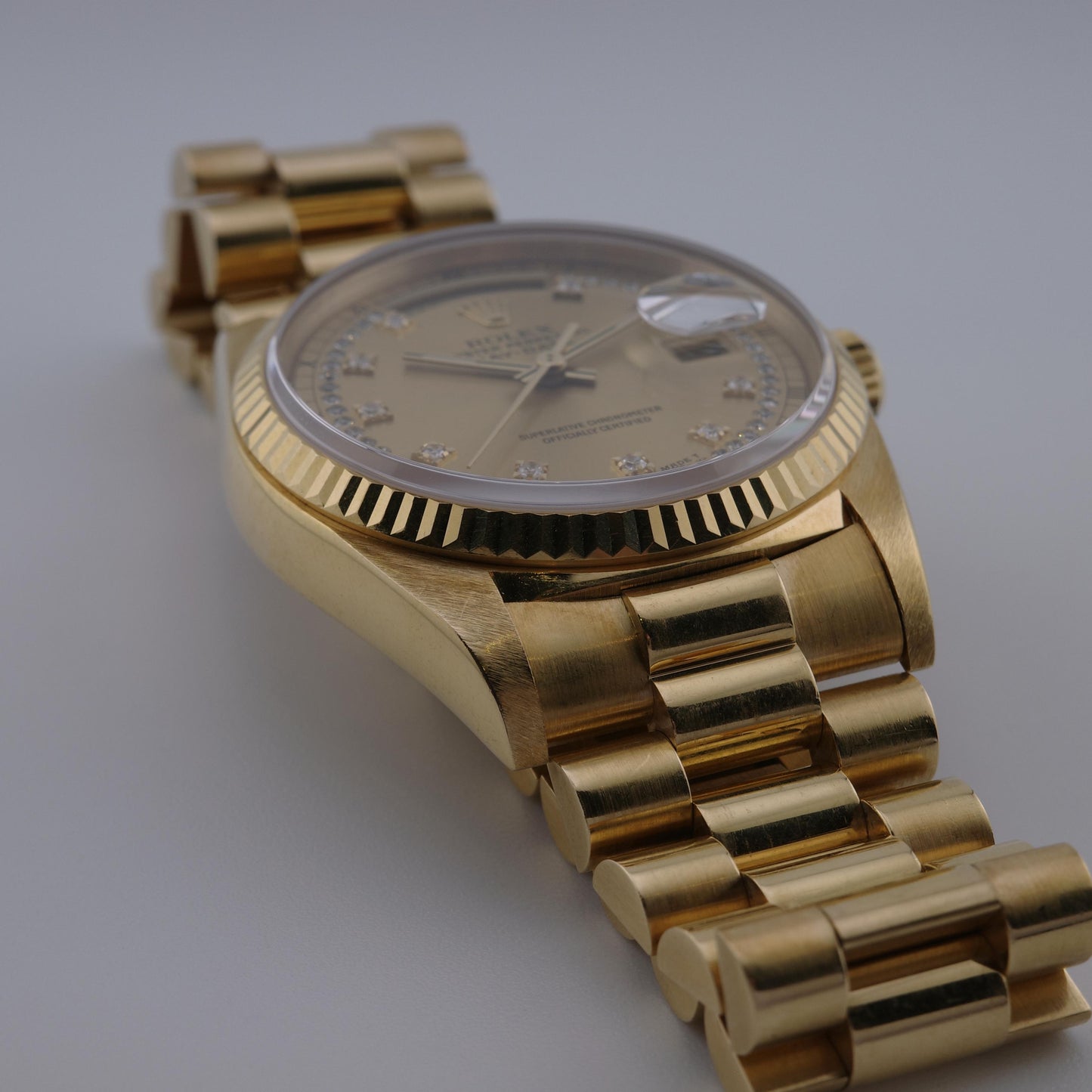18K 1991 Rolex Day-Date 18238 36mm Diamond String Dial Watch